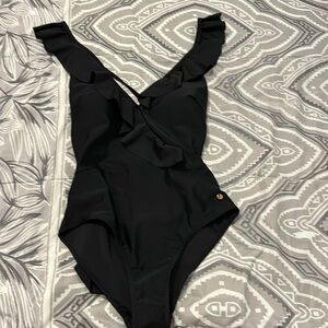 Joan Vass One piece ruffle trim swimsuit is super slimming! You’ll be stunning!